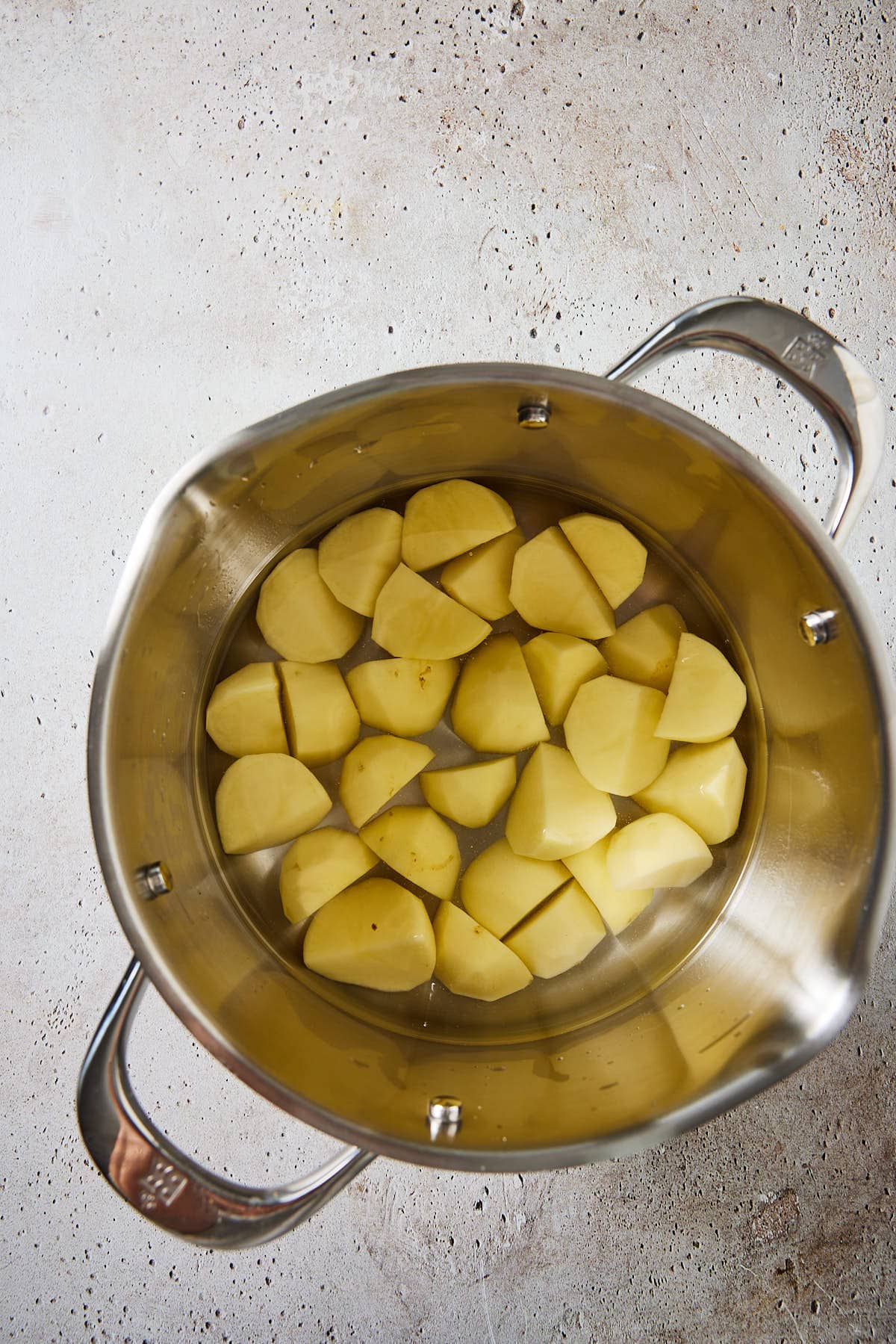 Clean the potatoes