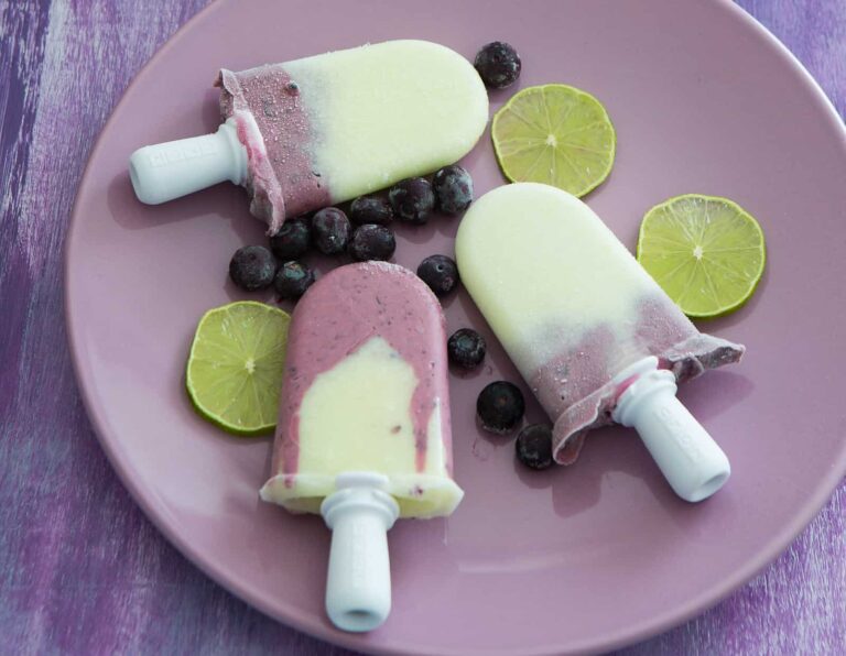 Melon popsicles with blueberries