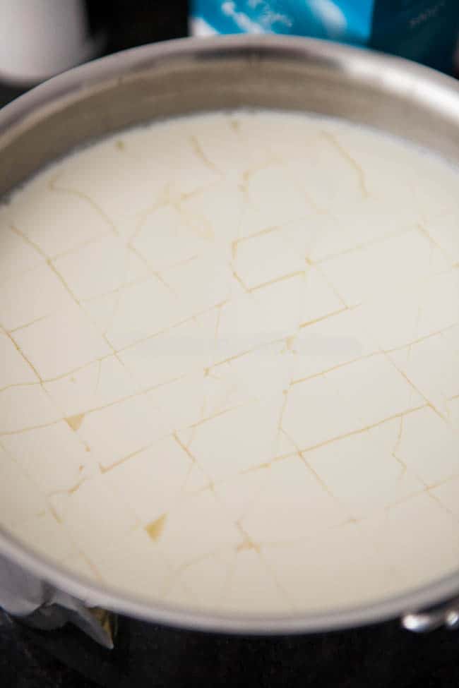 Cutting the curd while making the halloumi