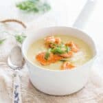 Cauliflower celeriac soup with salmon fillet