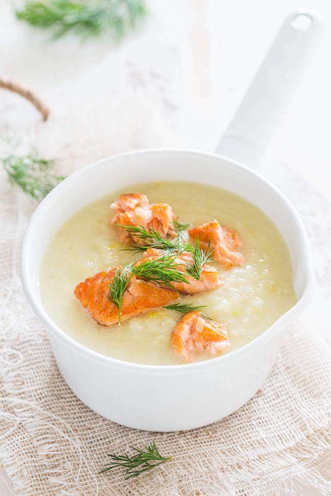Delicious celeriac soup with cauliflower and salmon