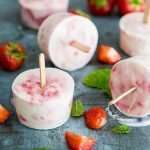 Yoghurt strawberry and raspberry popsicles