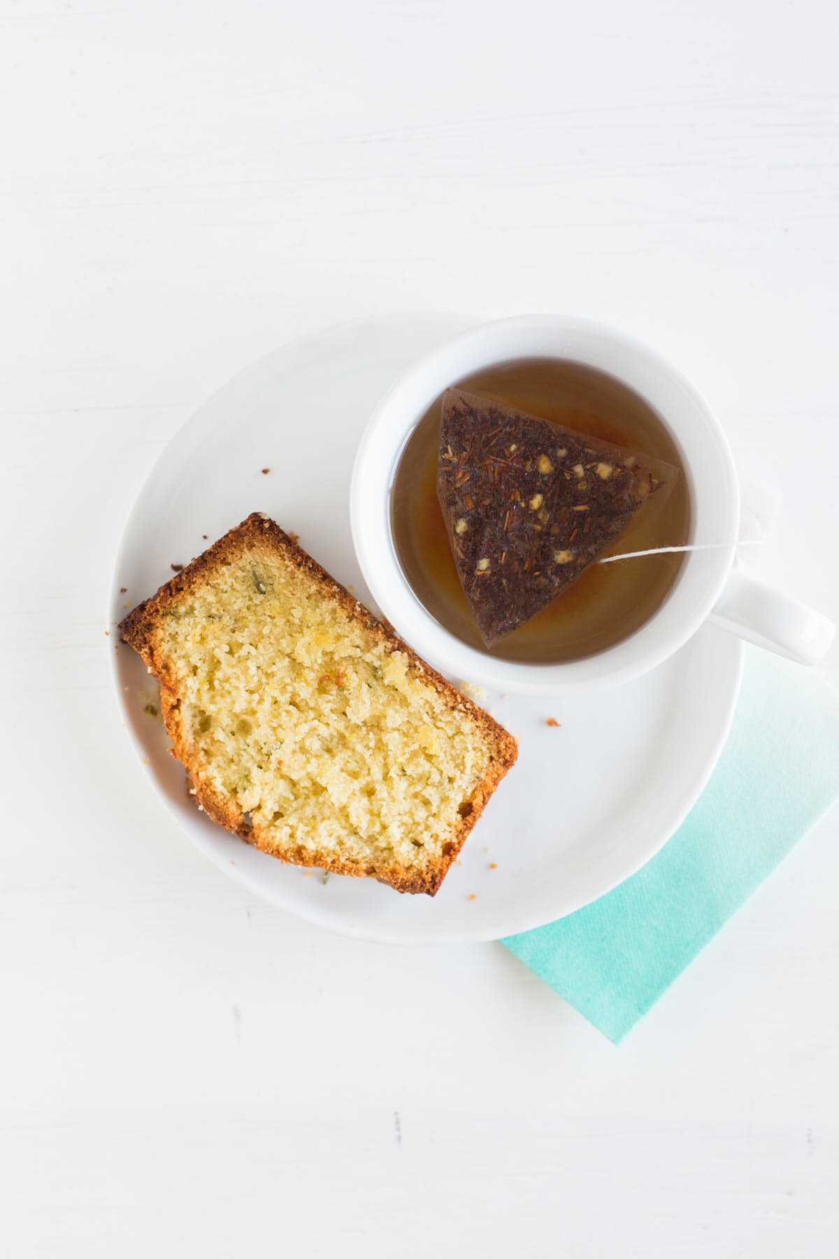 Slice of lemon loaf with a cup of tea