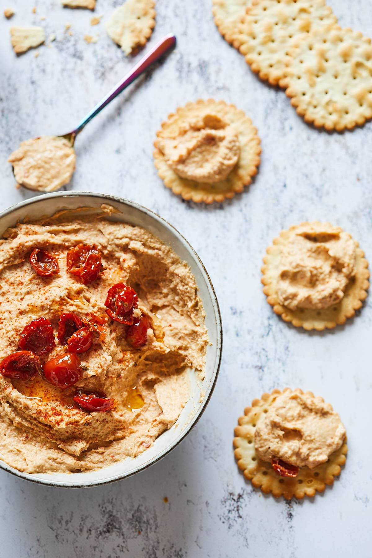 Roasted garlic hummus with sun dried tomatoes and crackers
