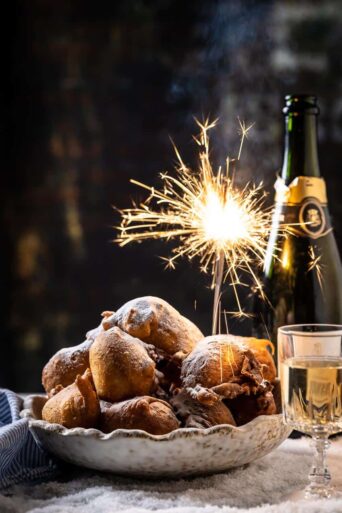 Dutch doughnuts with a bottle of champagne