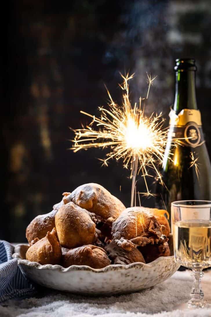 Dutch doughnuts with a bottle of champagne
