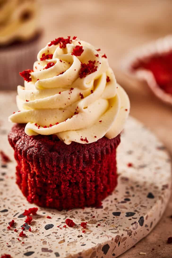 red velvet cupcakes with white chocolate buttercream frosting