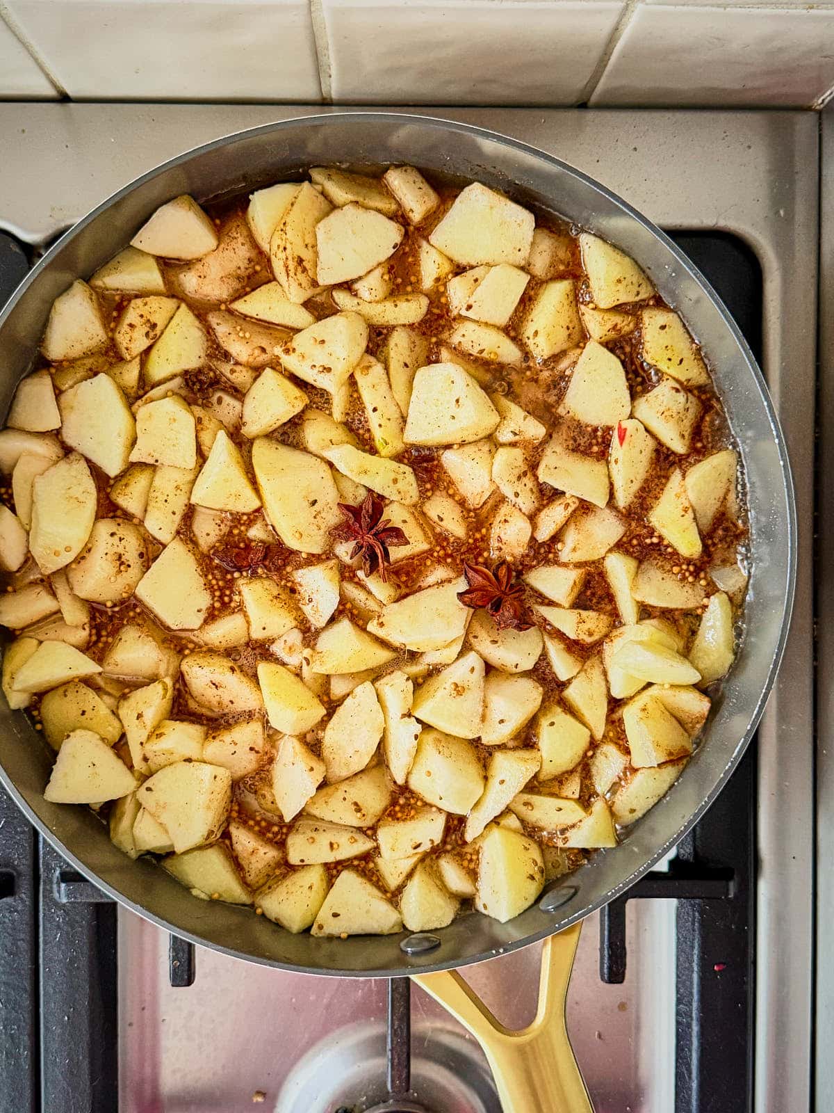 Add the fruit to a large pot and bring to a boil
